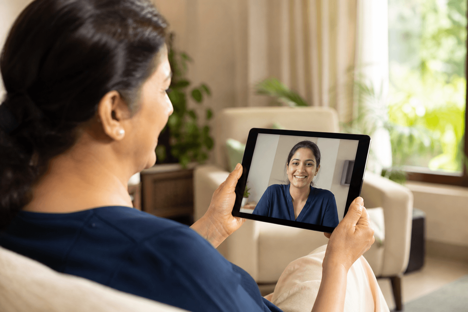 Patient receiving reassuring follow-up support at home